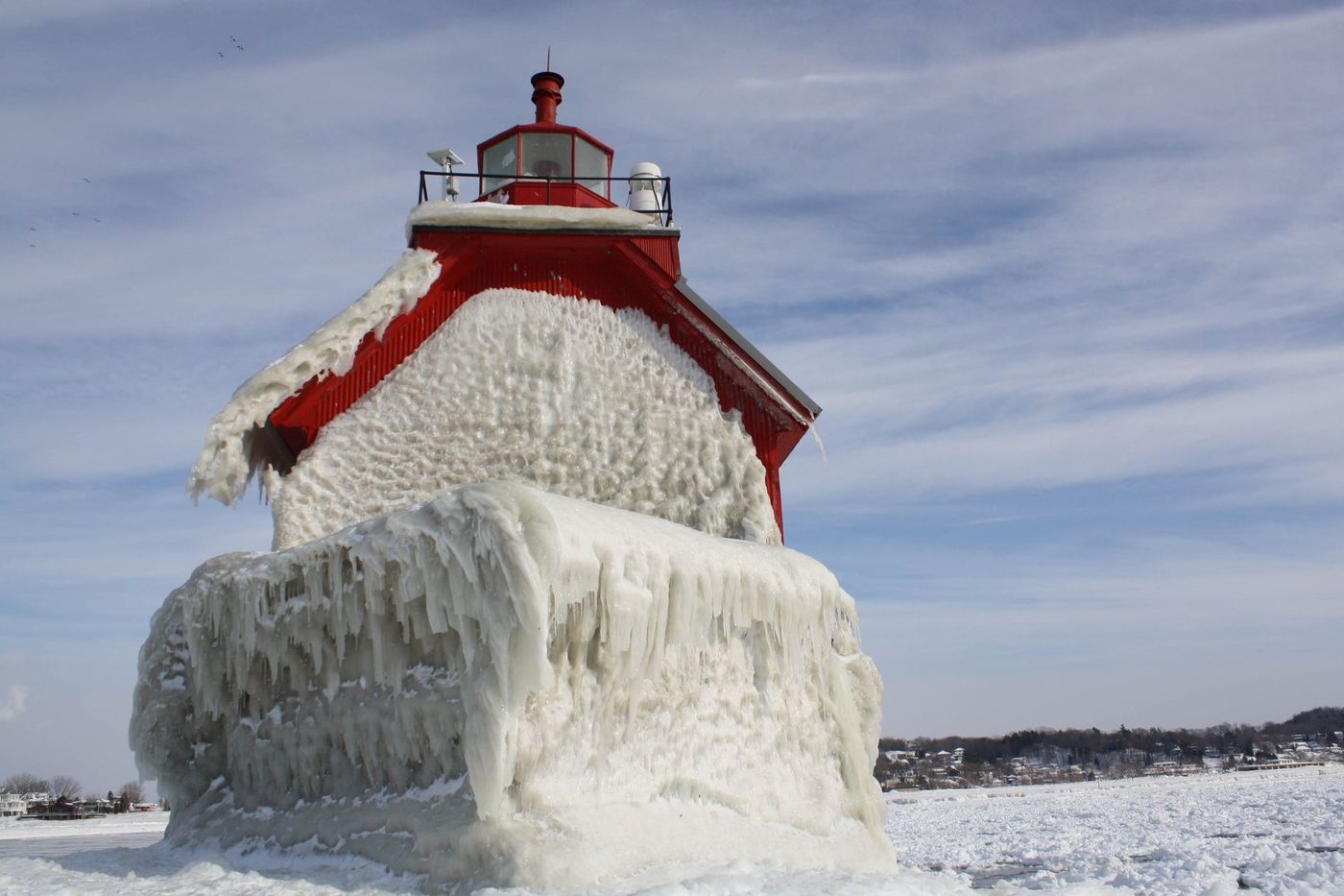 The outer red pier light at Grand Haven, Michigan, seen head-on from the south pier.