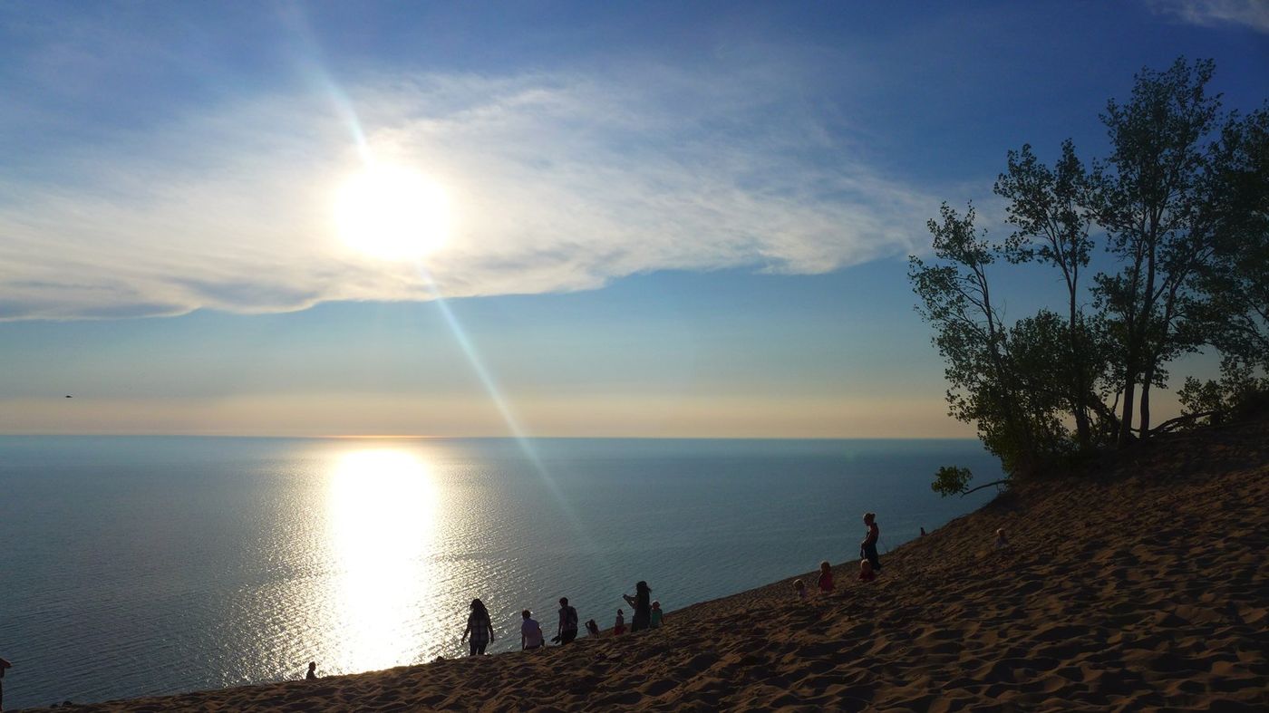 The sun setting into Lake Michigan from Empire Bluff at Sleeping Bear Dunes National Lakeshore.